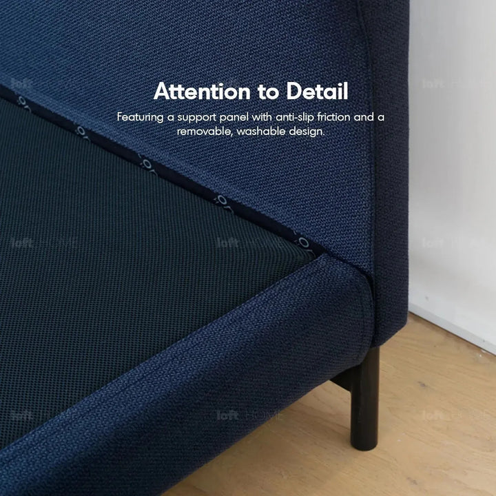 Minimalist fabric bed nor in details.