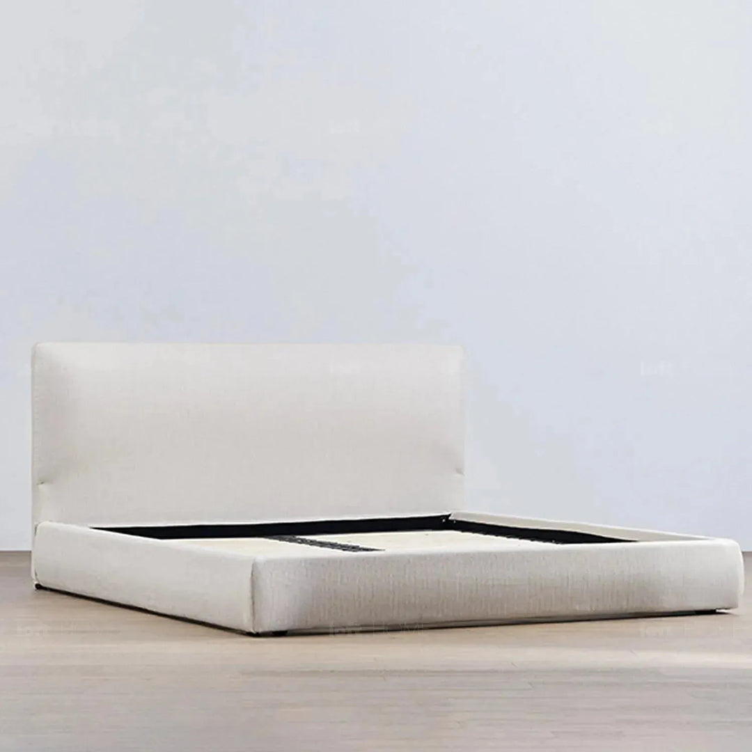 Minimalist fabric bed sino in close up details.