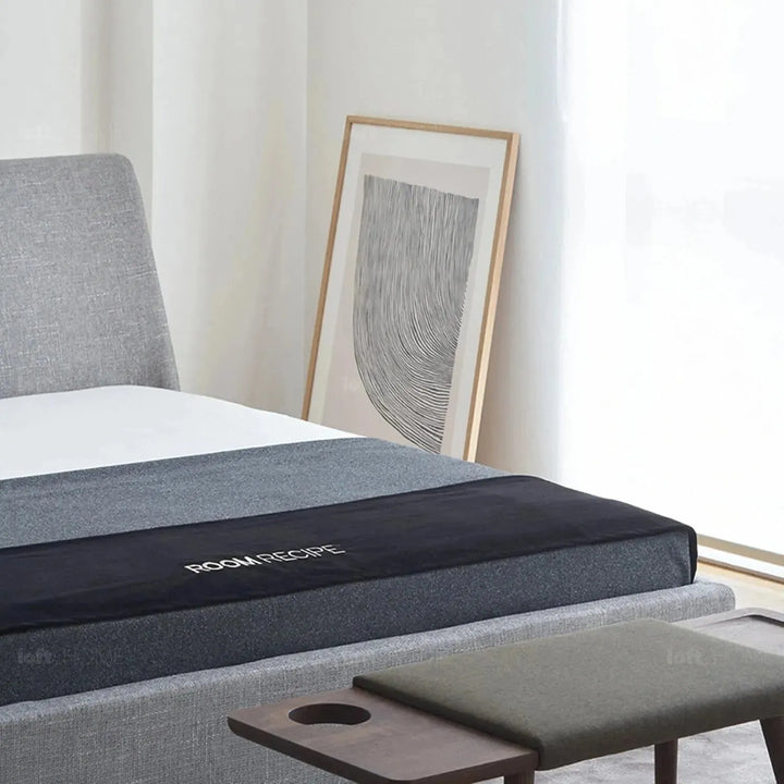 Minimalist fabric bed vaselli in details.
