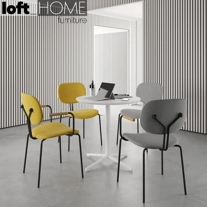 Industrial fabric dining chair et arm in real life style.