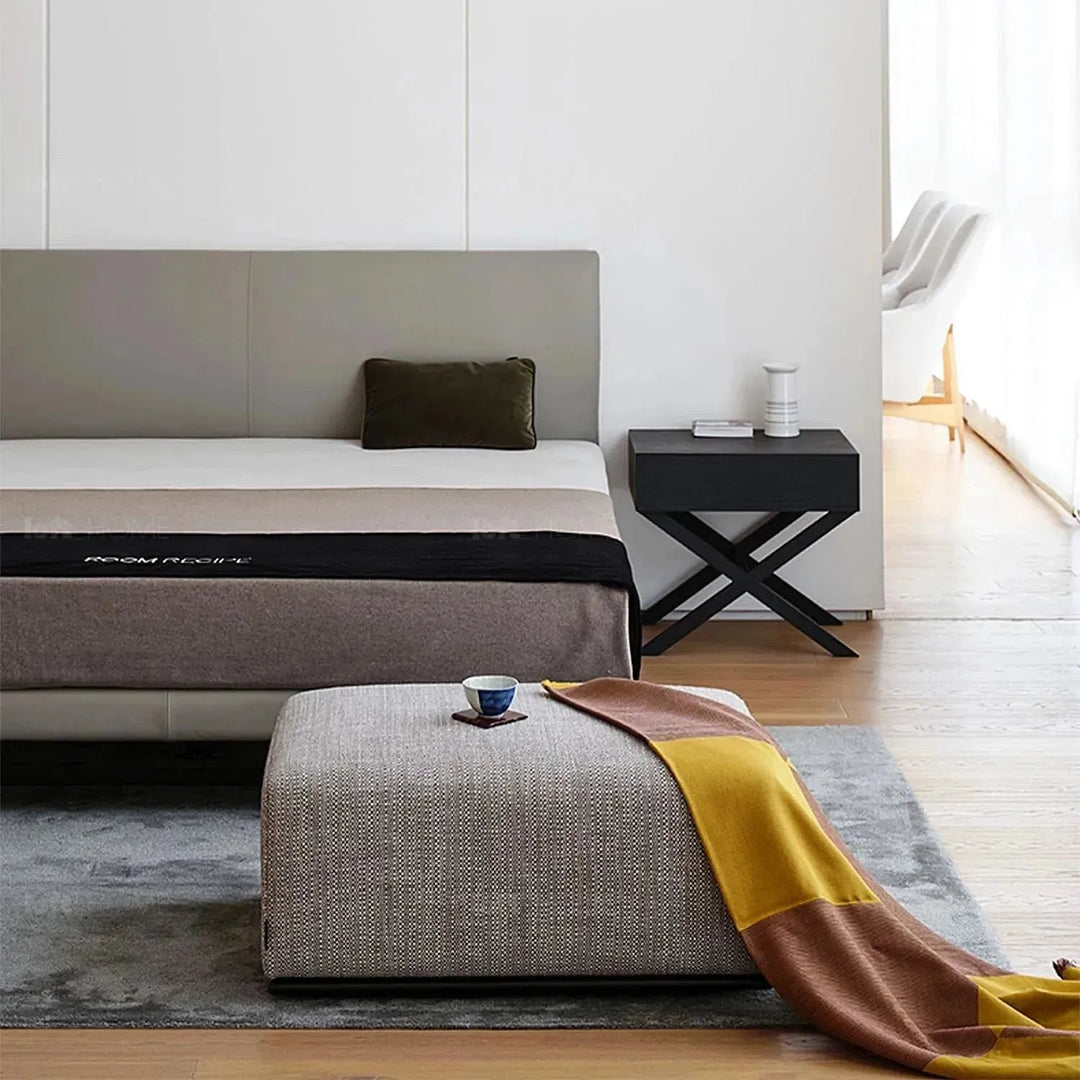 Minimalist fabric ottoman nemo in close up details.