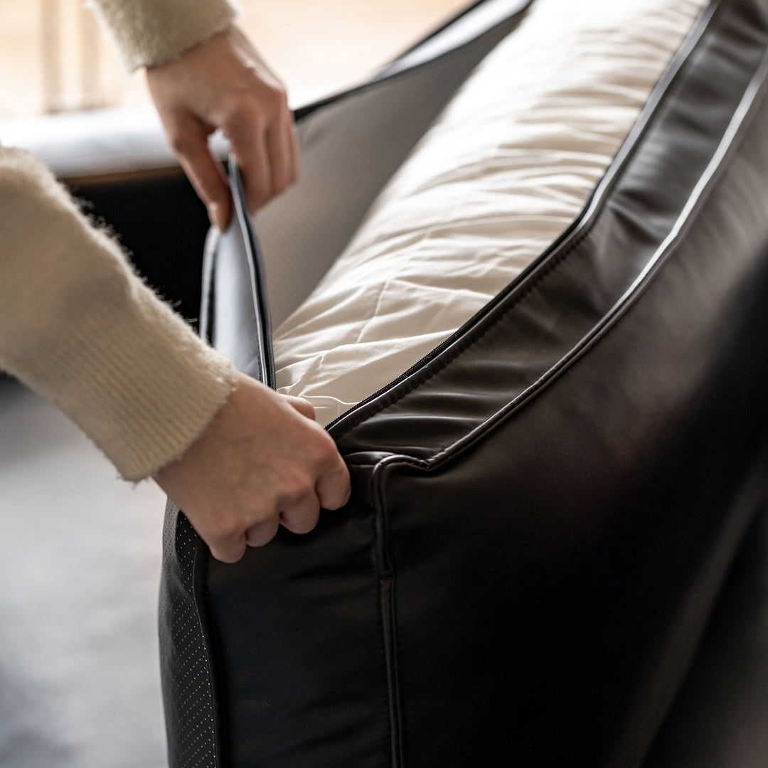 Minimalist Microfiber Leather 1 seater sofa unique in still life.
