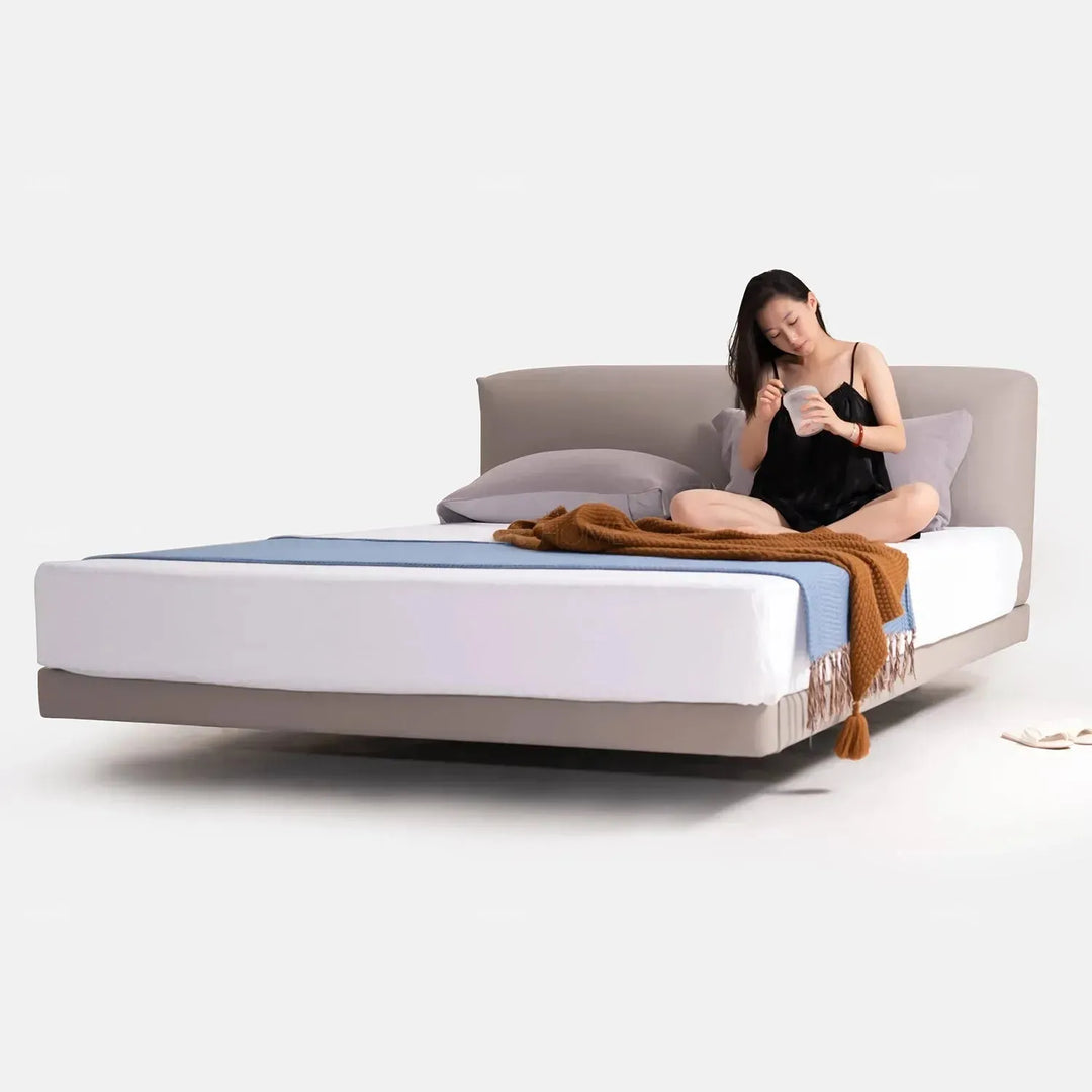 Minimalist genuine leather floating bed bence in details.