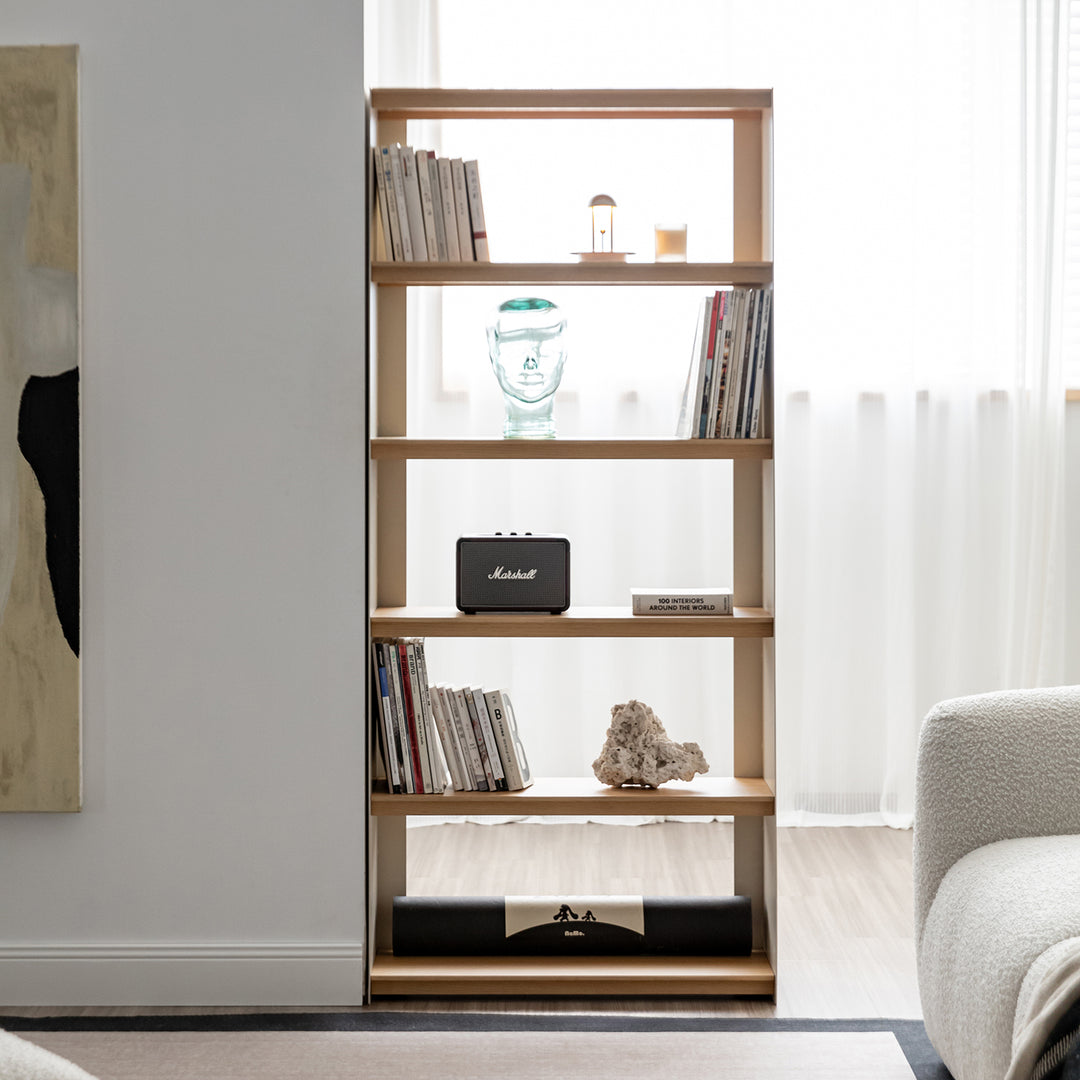 Minimalist stainless steel bookshelf aesop in close up details.