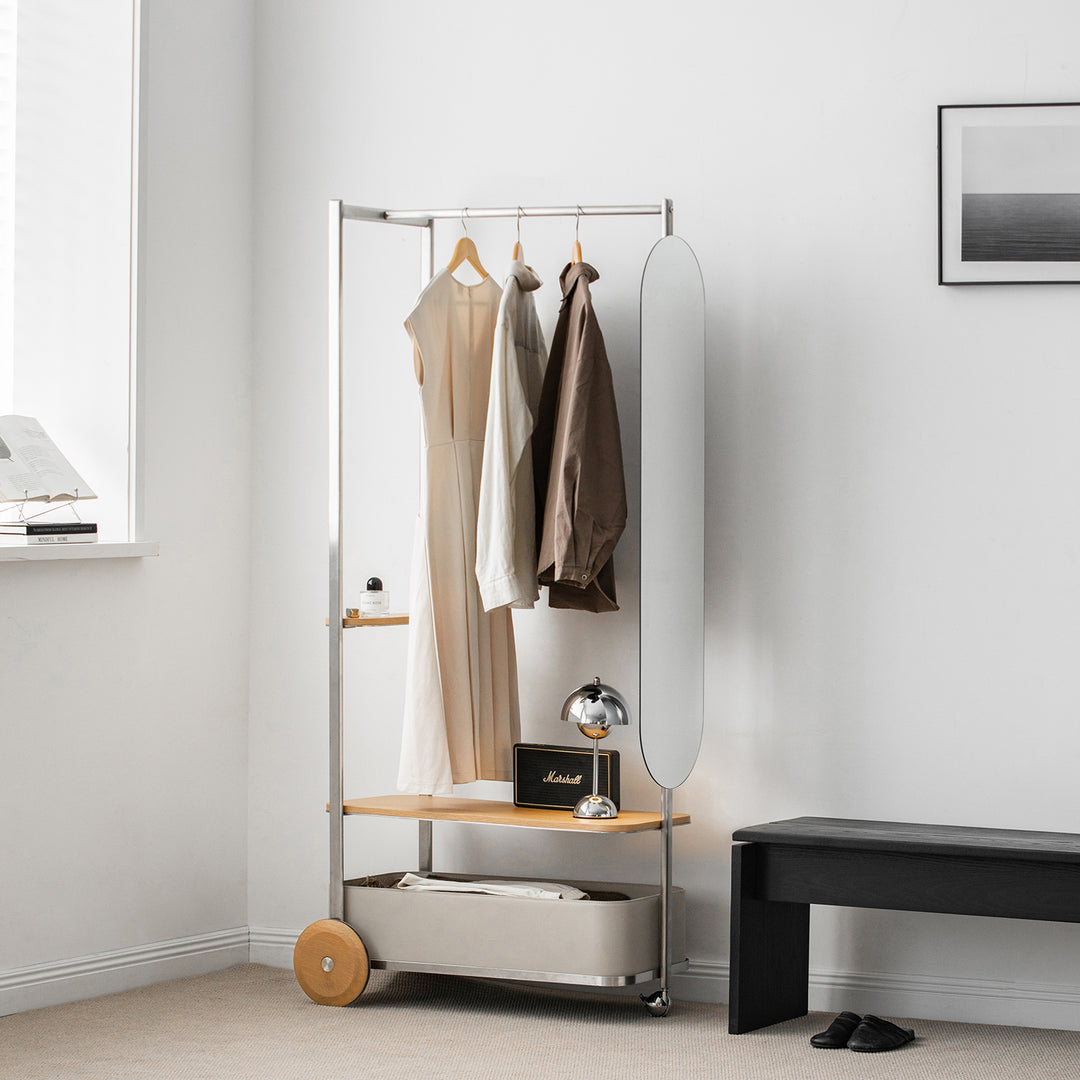 Minimalist stainless steel clothes hanger hera in close up details.