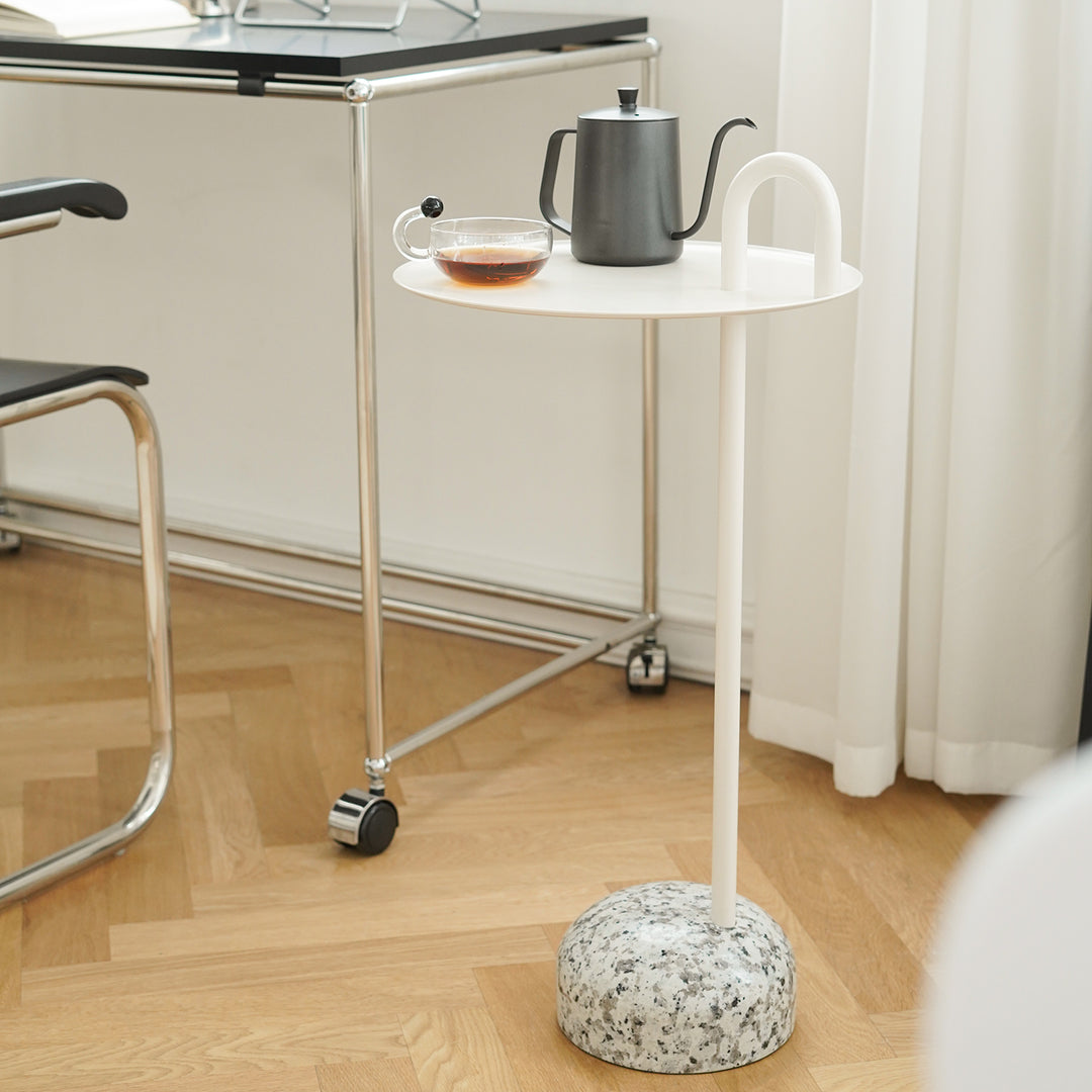 Minimalist steel marble side table loop in still life.