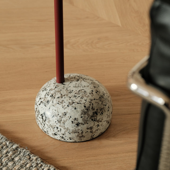 Minimalist steel marble side table loop in real life style.