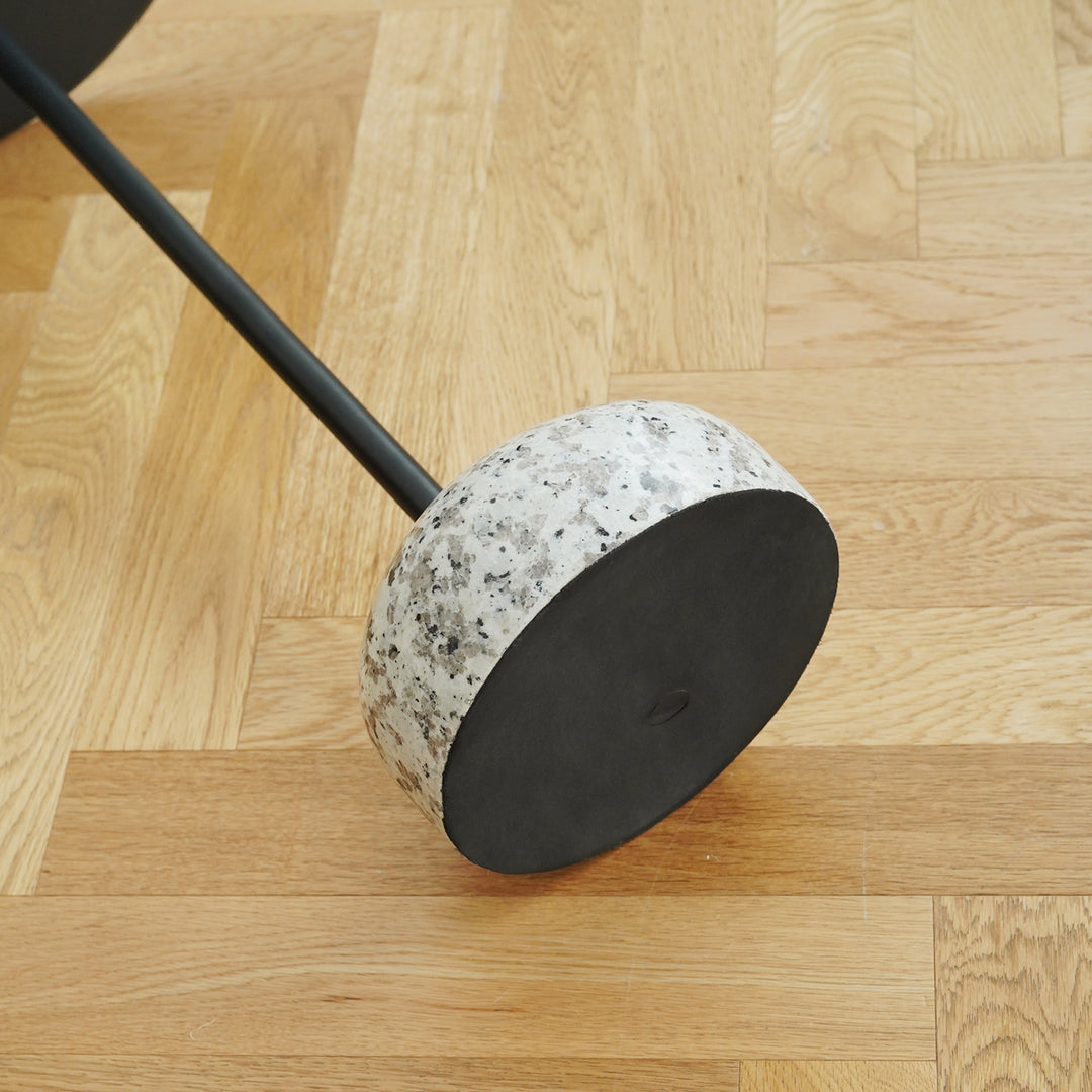 Minimalist steel marble side table loop in panoramic view.