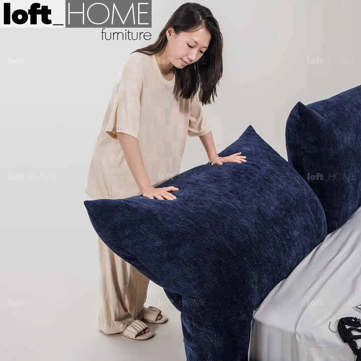 Contemporary velvet fabric bed standard in details.