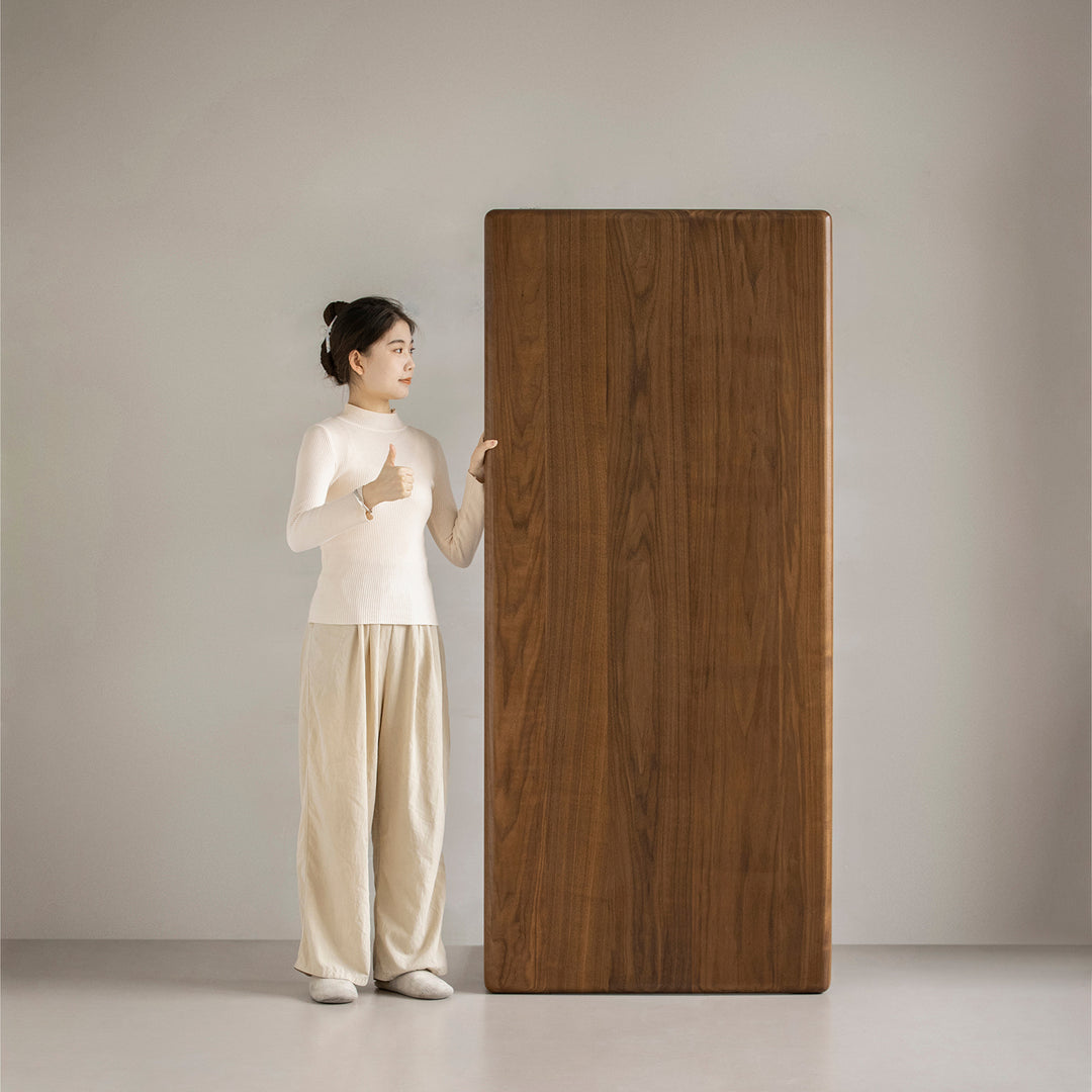 Mininalist walnut wood dining table conti in panoramic view.