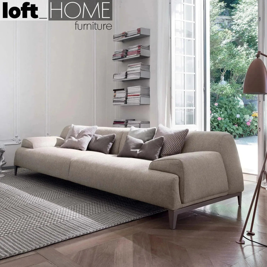 Modern fabric 3 seater sofa cave in details.