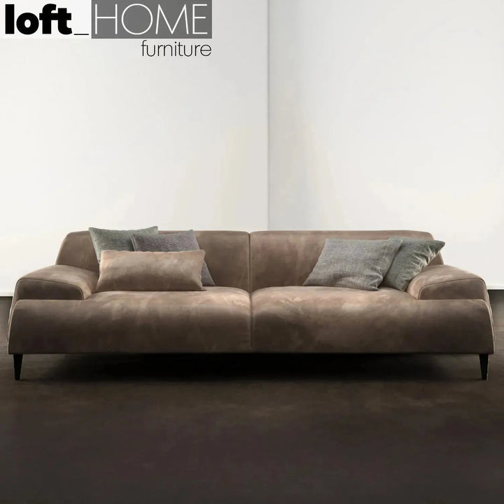 Modern fabric 3 seater sofa cave in panoramic view.