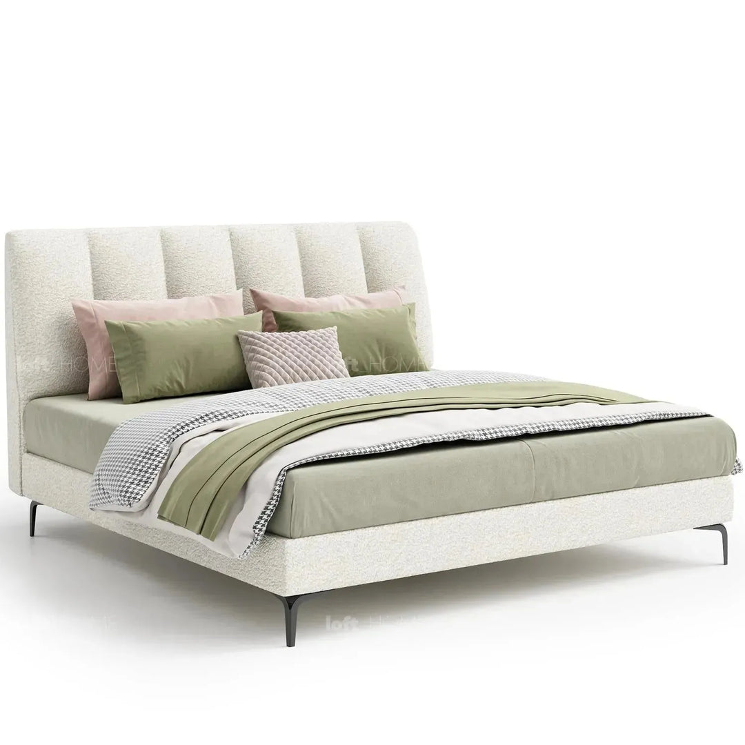 Cream sheepskin fabric bed cory in white background.