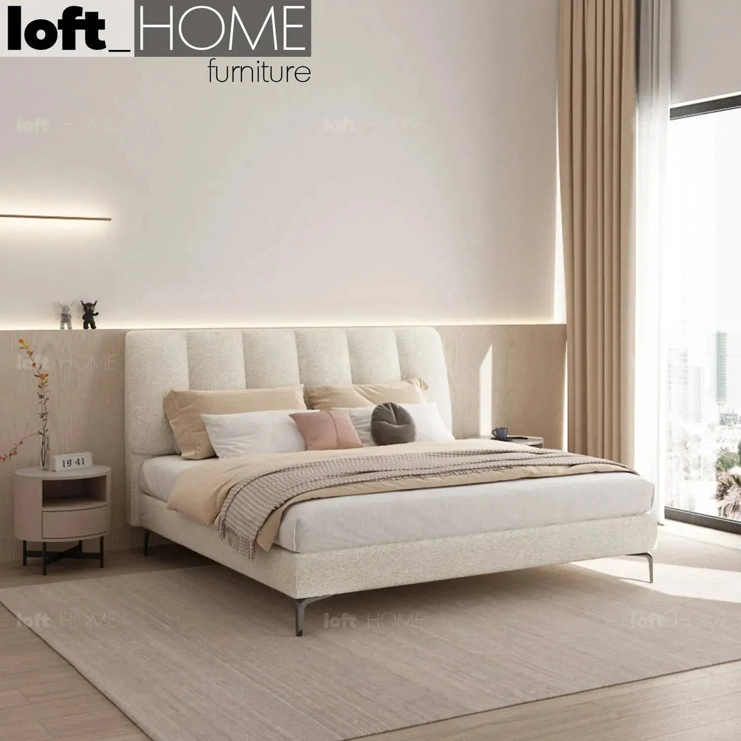 Cream sheepskin fabric bed cory in details.