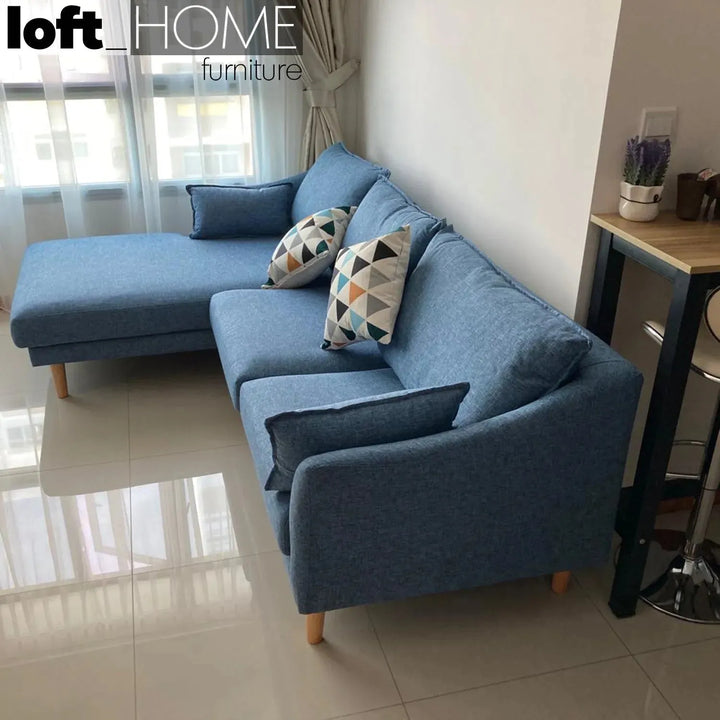 Scandinavian fabric l shape sectional sofa cammy 2+l in panoramic view.