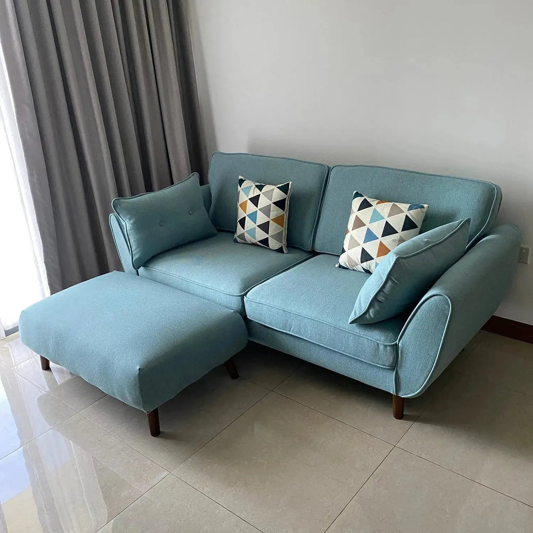 Scandinavian fabric ottoman henri in still life.