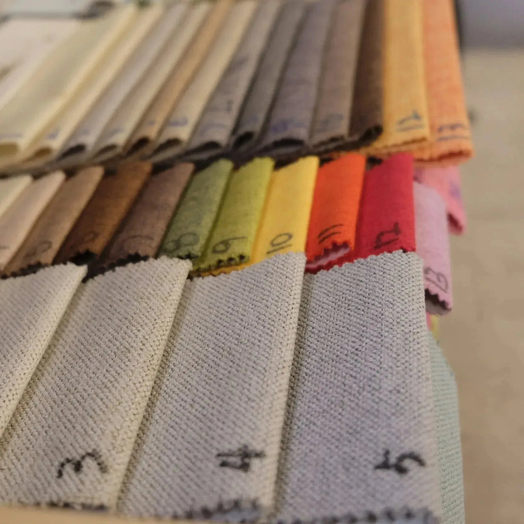 Scandinavian fabric ottoman henri in real life style.