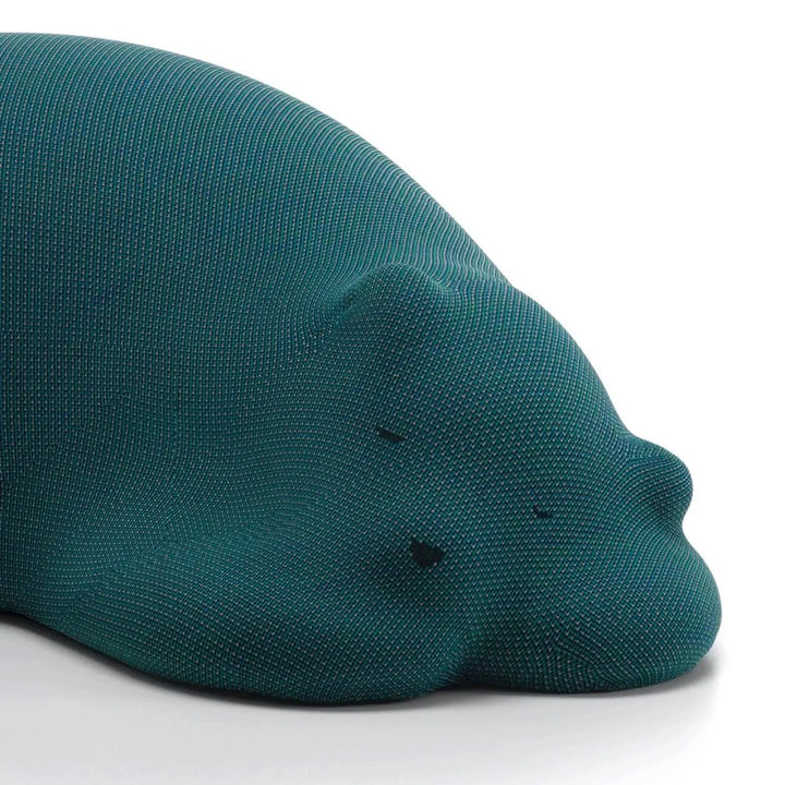 Contemporary knit fabric ottoman resting bear conceptual design.