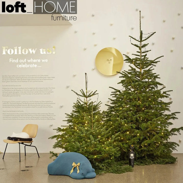 Contemporary knit fabric ottoman resting bear in close up details.