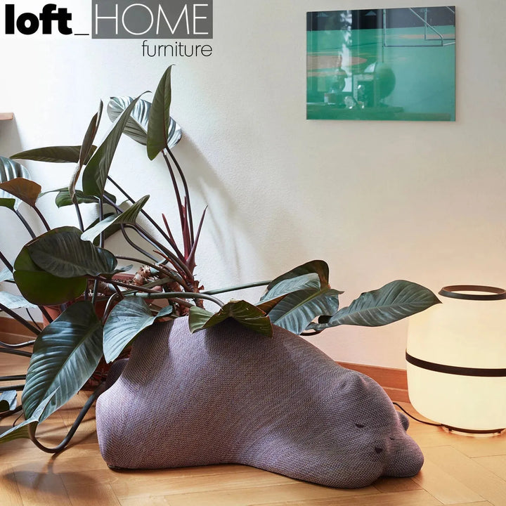 Contemporary knit fabric ottoman resting bear detail 2.