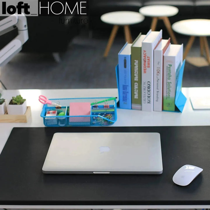 Modern leather smooth desk mat with fixation lip decor in details.