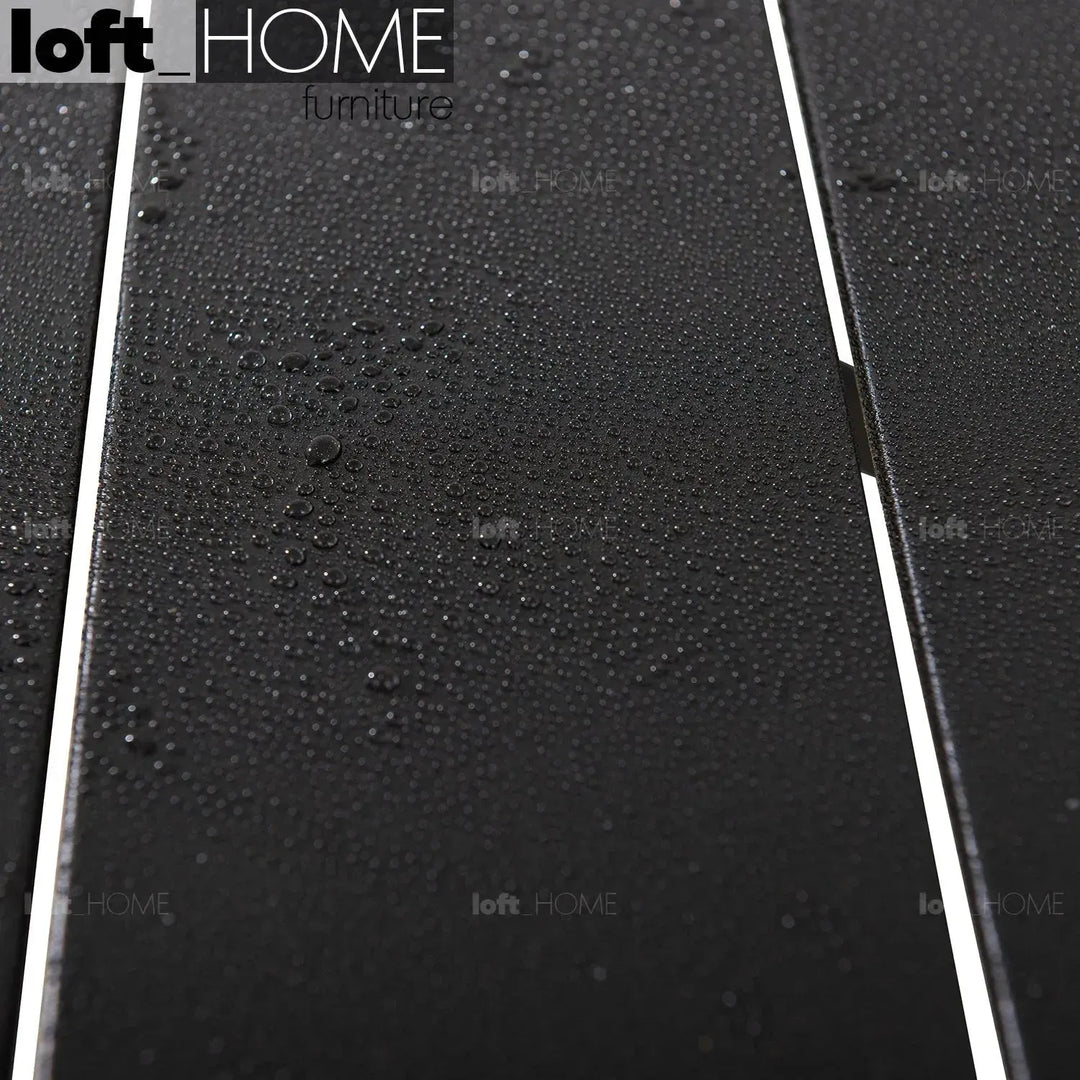 Industrial outdoor dining table patio in close up details.