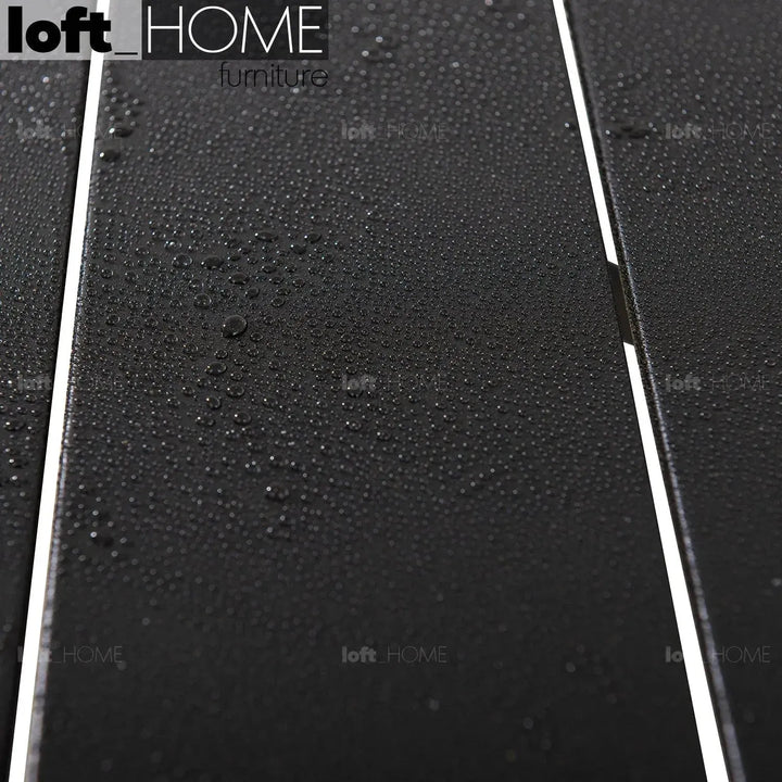 Industrial outdoor dining table patio in close up details.