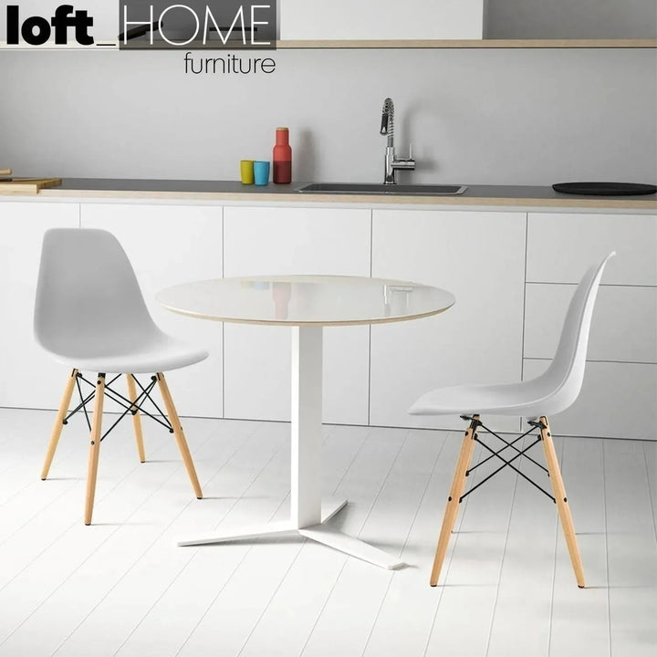 Contemporary plastic dining chair eames grey primary product view.