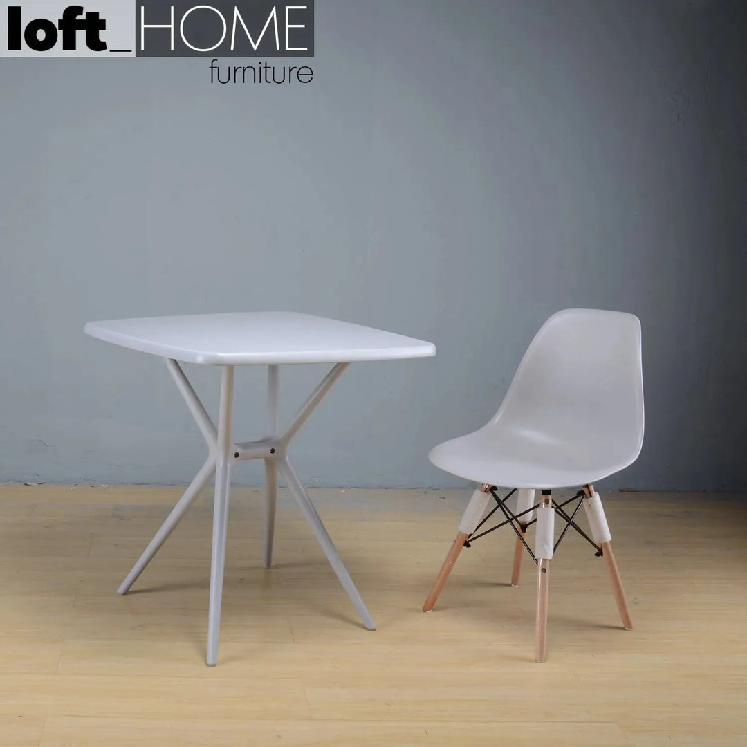 Contemporary plastic dining chair eames grey material variants.