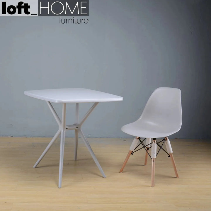 Contemporary plastic dining chair eames grey material variants.