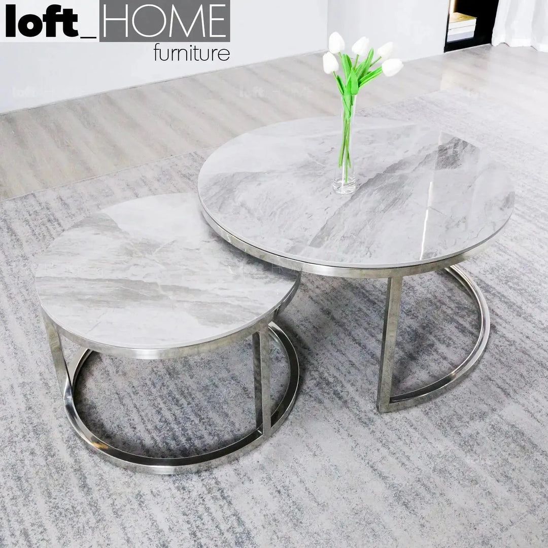 Modern sintered stone coffee table silver with context.
