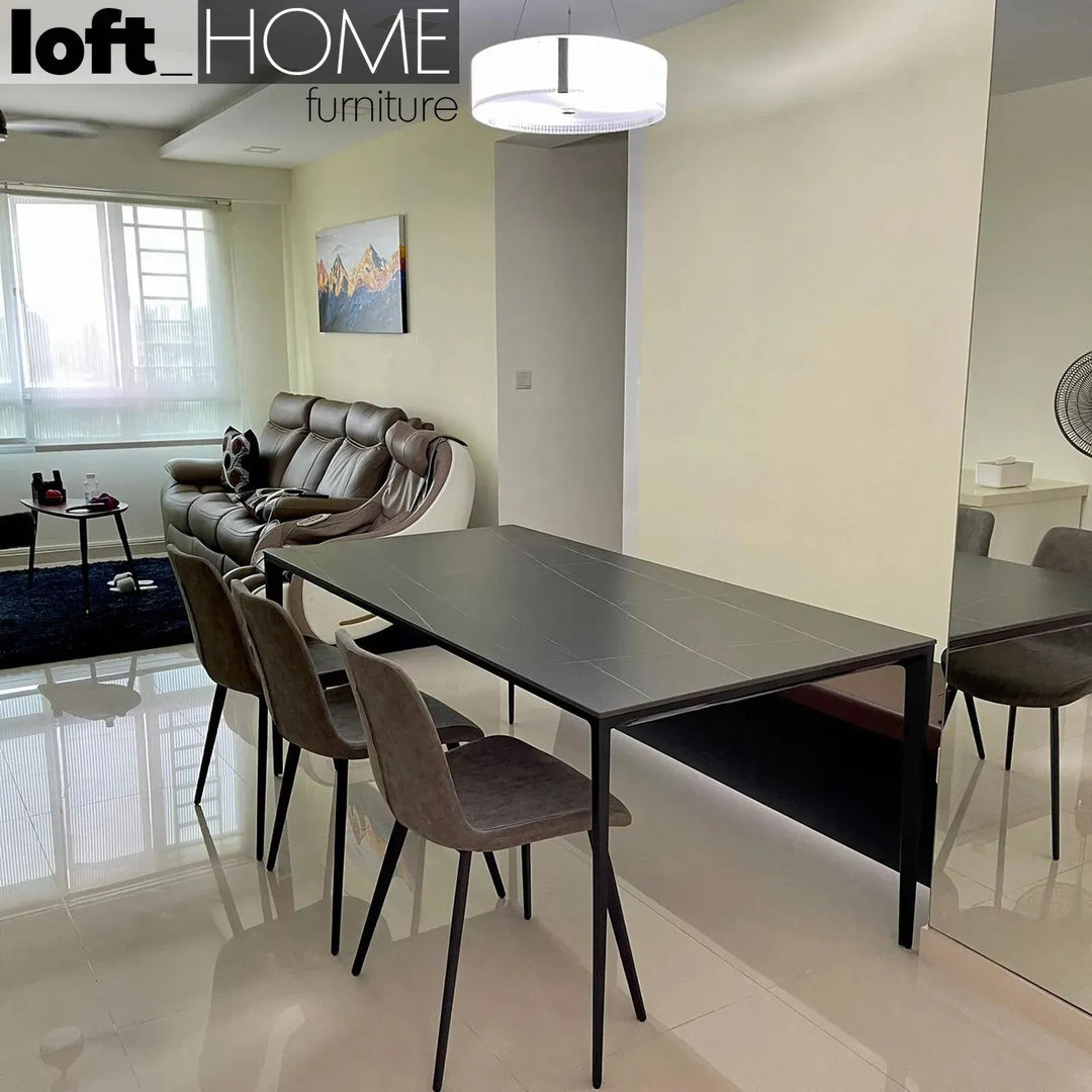 Minimalist sintered stone dining table long island black in panoramic view.