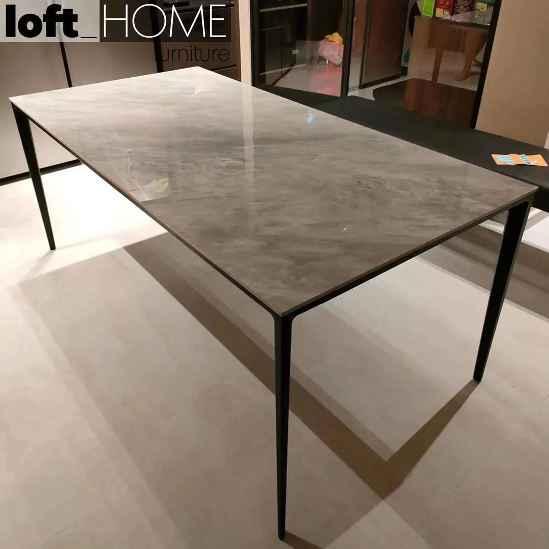 Minimalist sintered stone dining table long island black conceptual design.