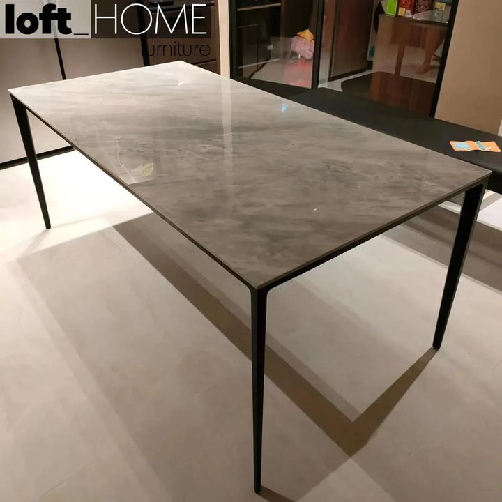 Minimalist sintered stone dining table long island black conceptual design.