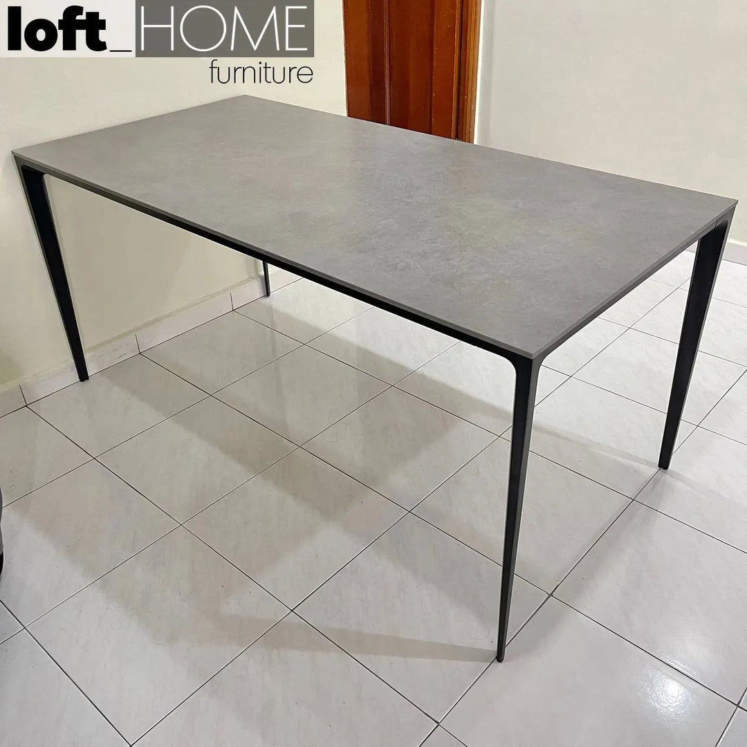 Minimalist sintered stone dining table long island black in still life.