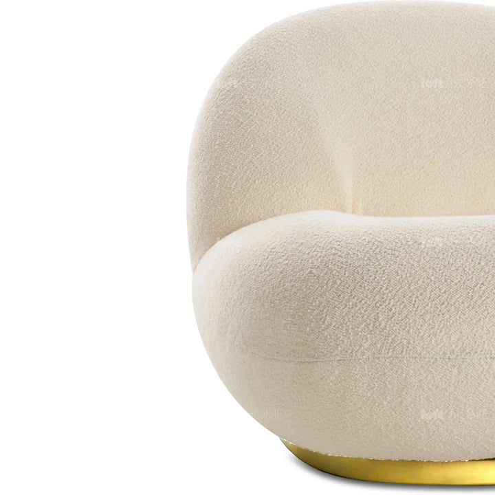 Cream teddy fabric 1 seater sofa pacha with context.