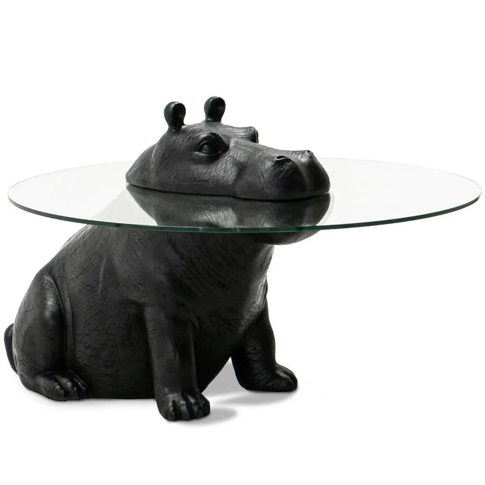 Contemporary tempered glass coffee table hippo in white background.