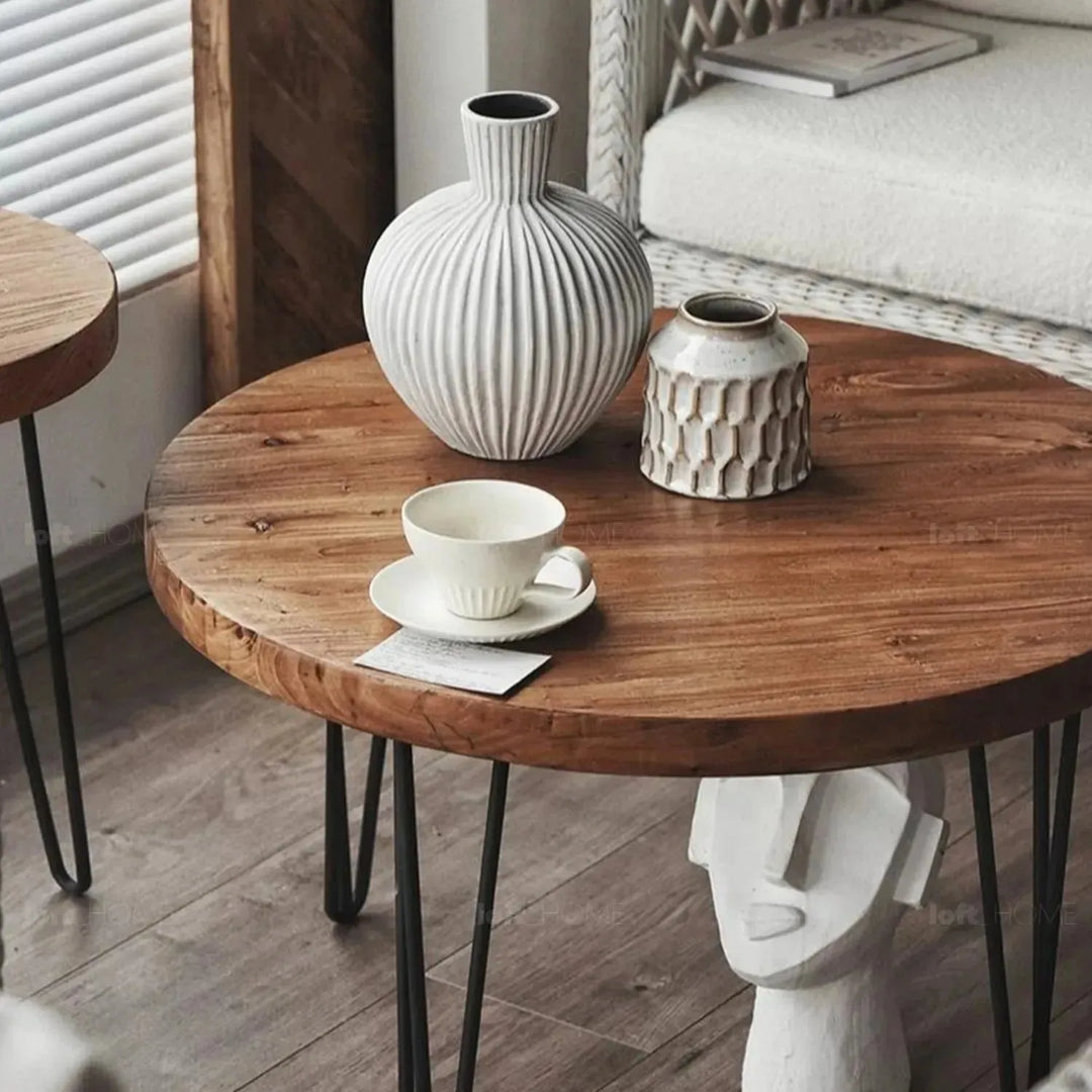 Rustic elm wood foldable round coffee table eclipse elm layered structure.