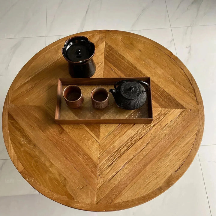 Rustic elm wood foldable round coffee table eclipse elm with context.