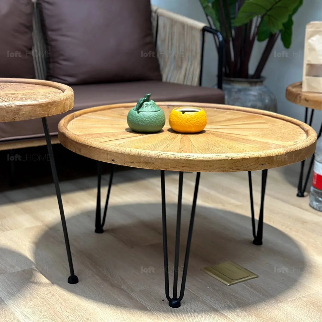 Rustic elm wood round coffee table aura elm with context.