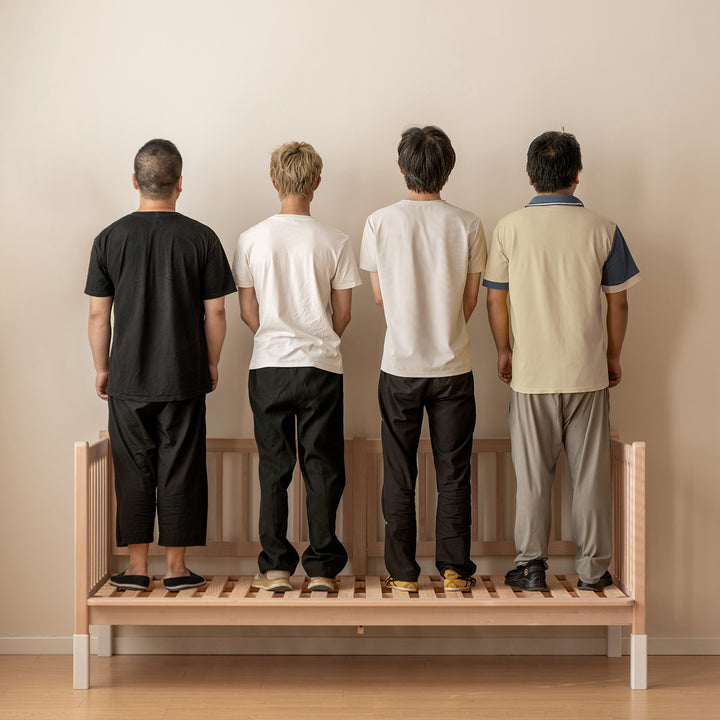 Scandinavian beech wood height adjustable kids sidecar bed with mattress set sova in still life.