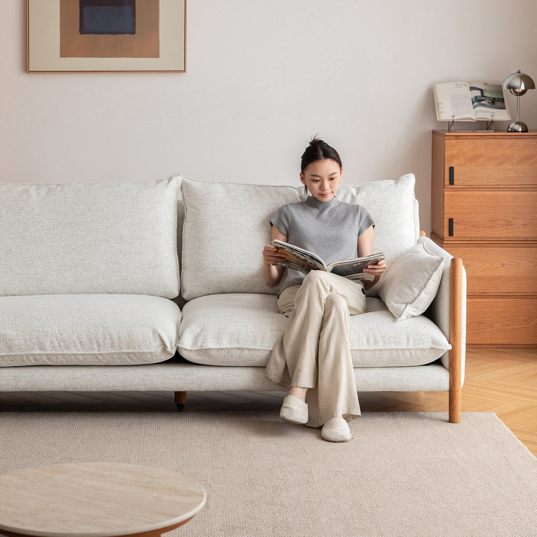 Scandinavian chenille velvet cherry wood 4 seater sofa sea salt in close up details.
