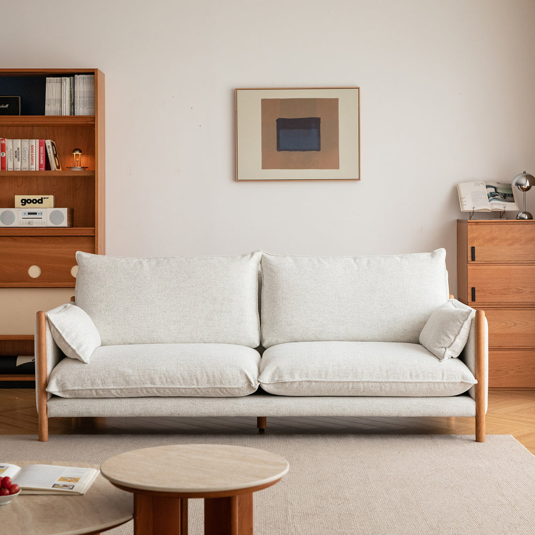 Scandinavian chenille velvet cherry wood 4 seater sofa sea salt in still life.