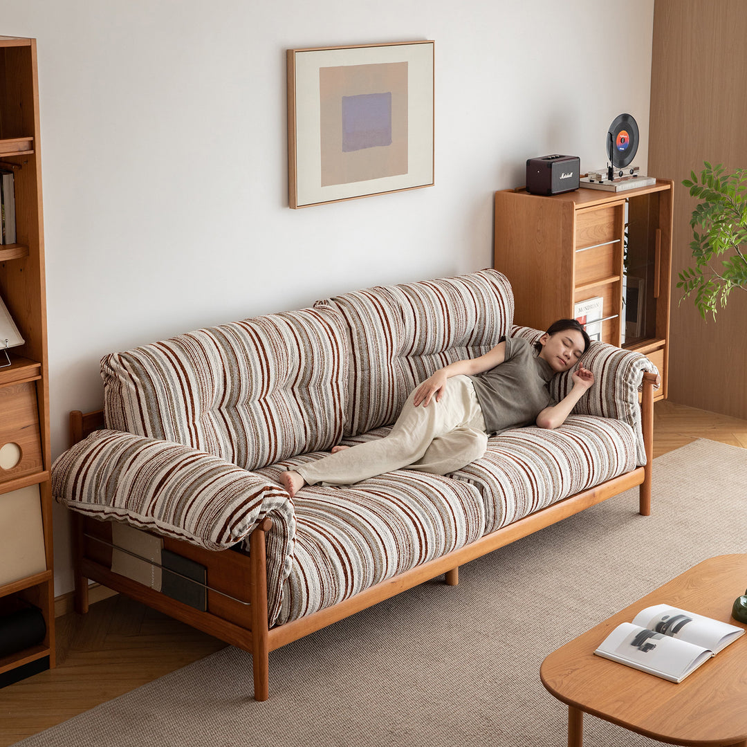 Scandinavian chenille velvet fabric cherry wood 3 seater sofa open backed in details.