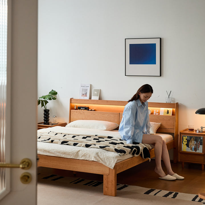 Scandinavian cherry wood bed accompany light material variants.