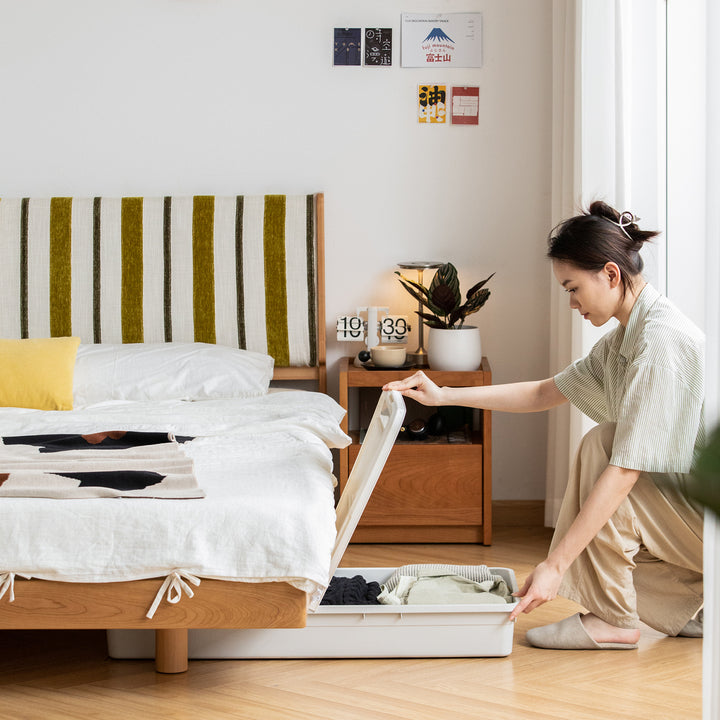 Scandinavian cherry wood bed les in panoramic view.