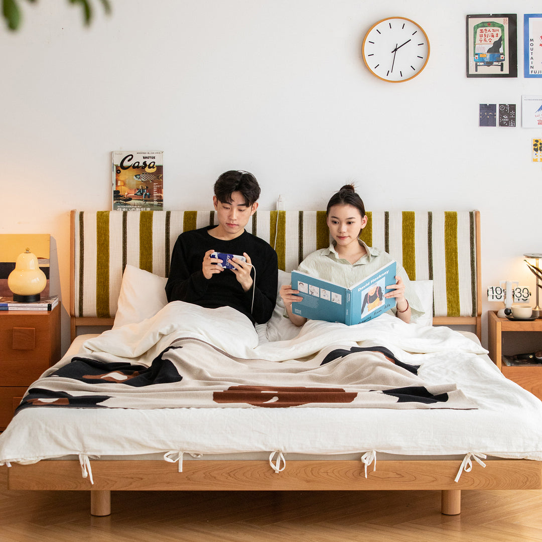 Scandinavian cherry wood bed les in still life.