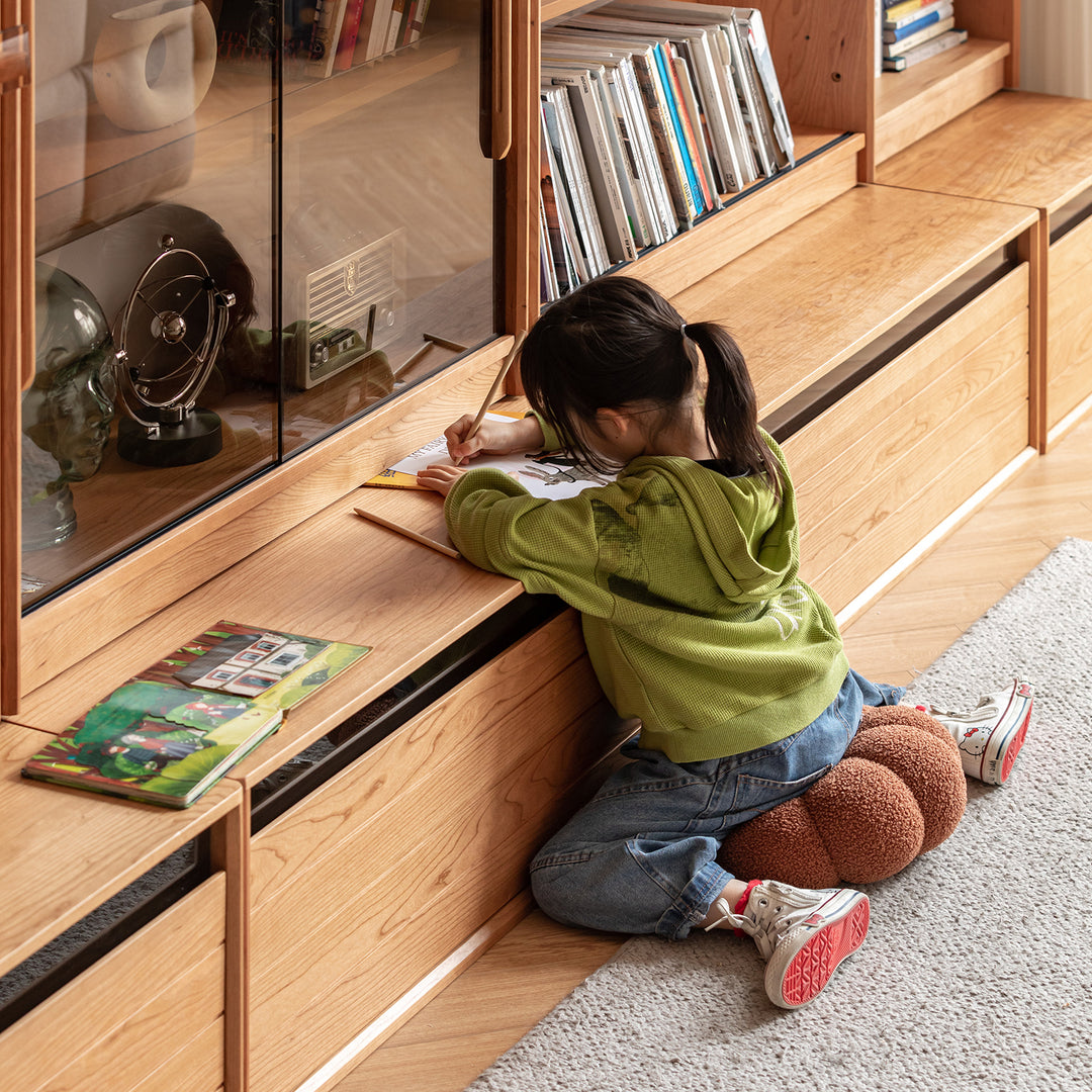 Scandinavian cherry wood bookshelf story with context.