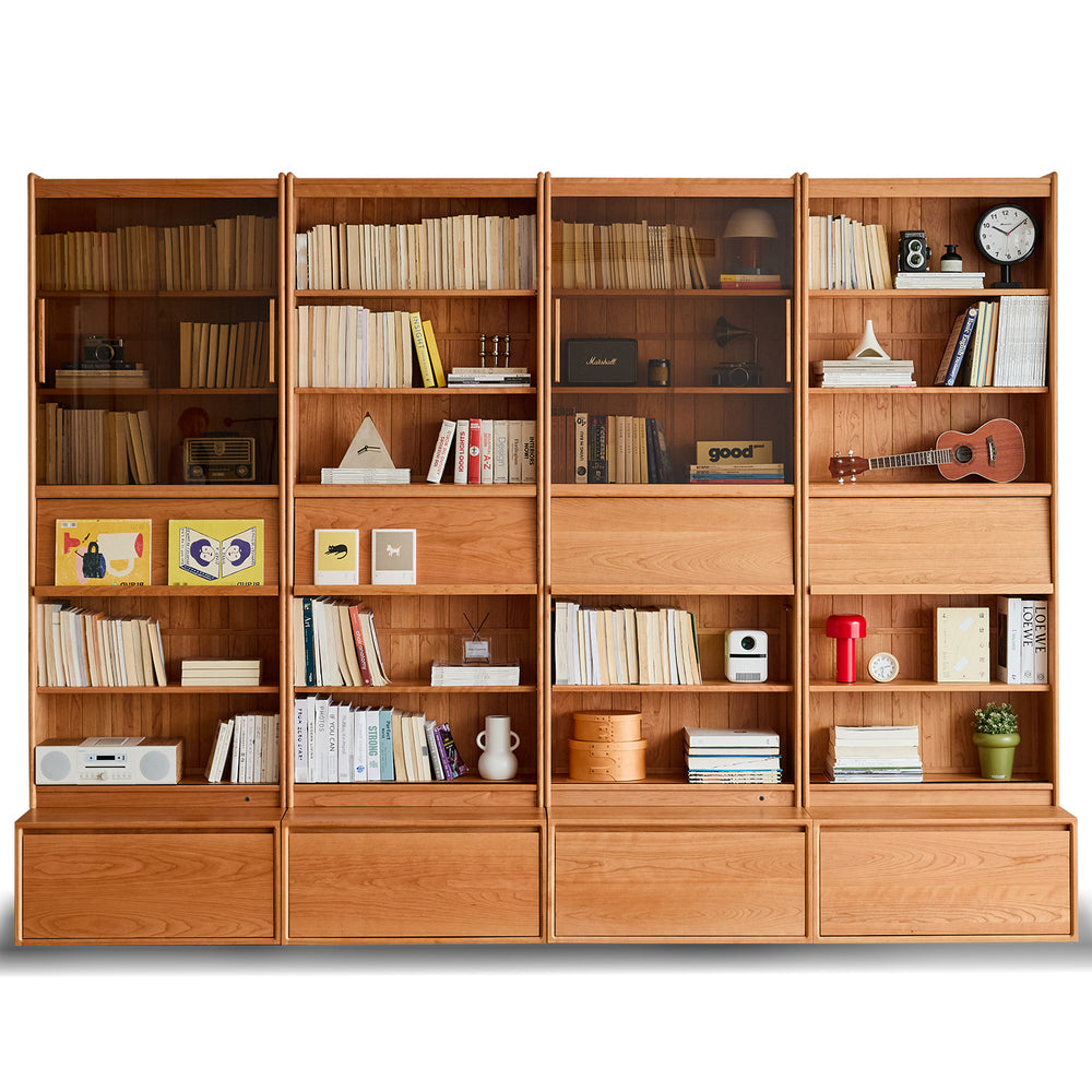 Scandinavian cherry wood bookshelf vista in white background.