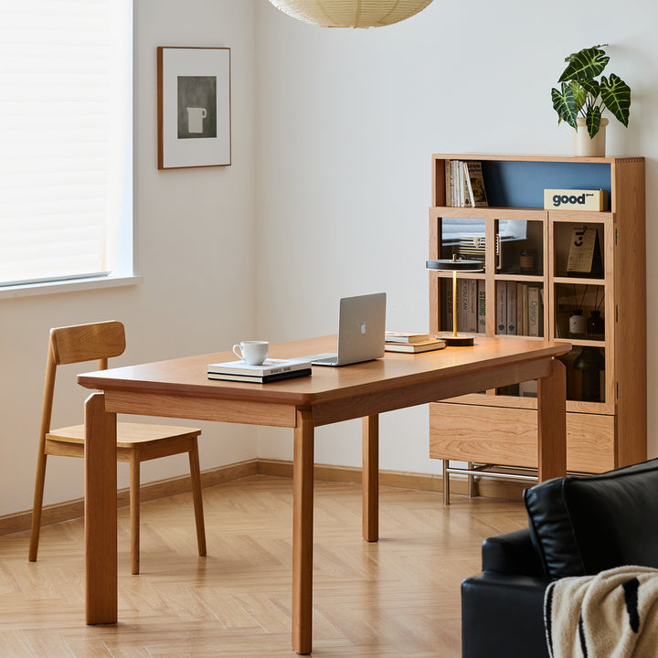 Scandinavian cherry wood dining table square in white background.
